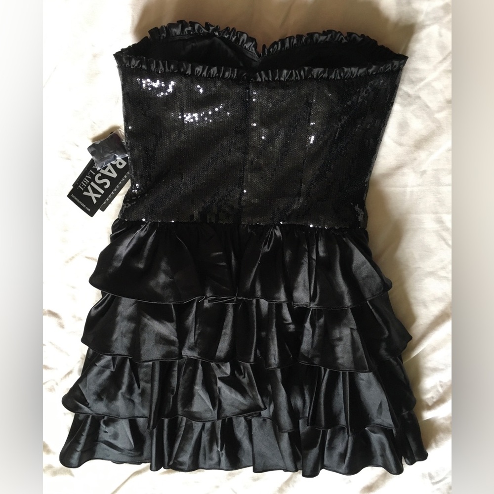 Woman’s beautiful black dress great for party wedding Christmas